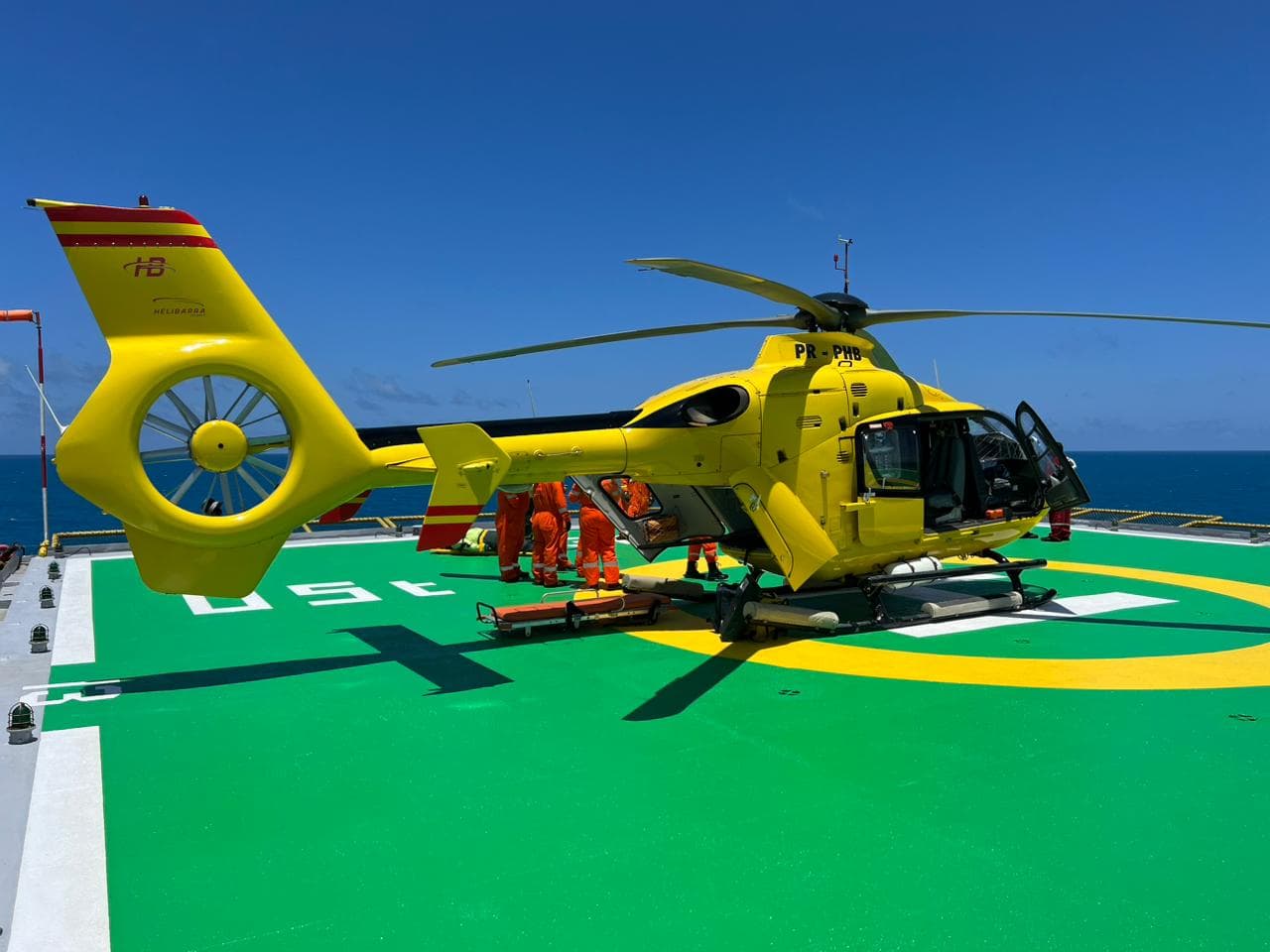 Helibarra EC-135 on offshore oil platform